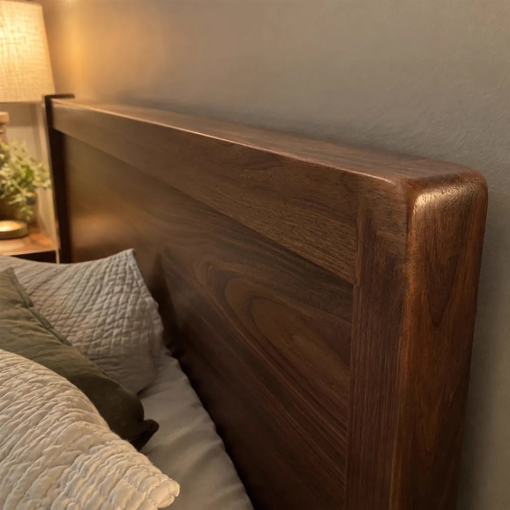Repaired walnut headboard corner